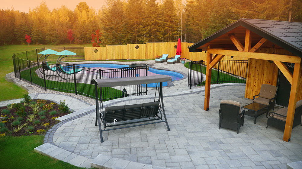Luxury backyard patio and pool house
